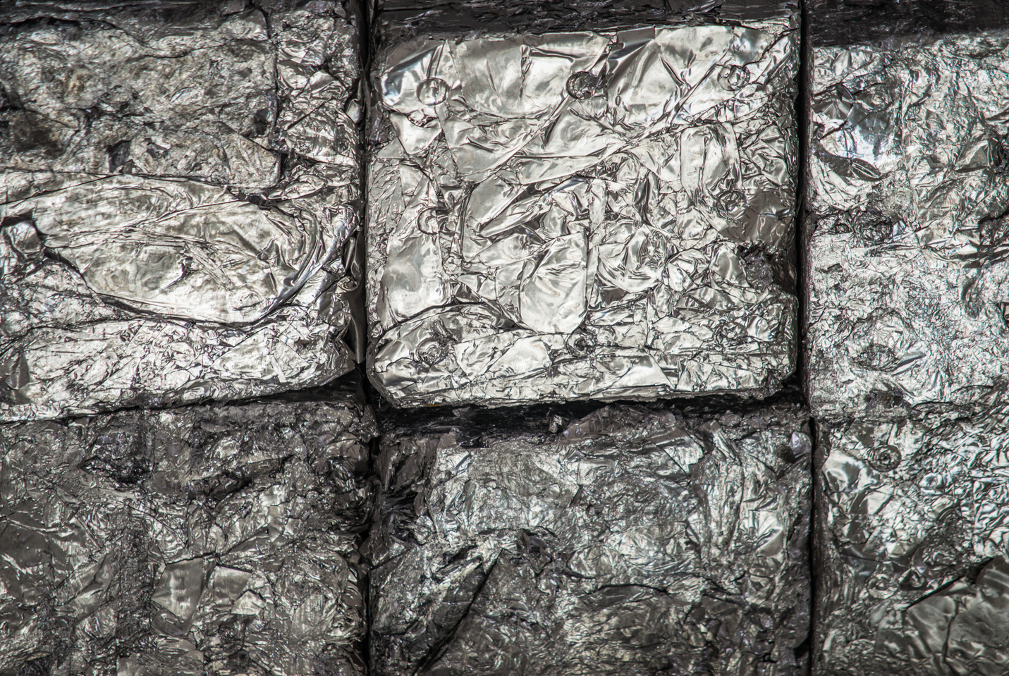 Stacks of aluminium blocks at recycling yard